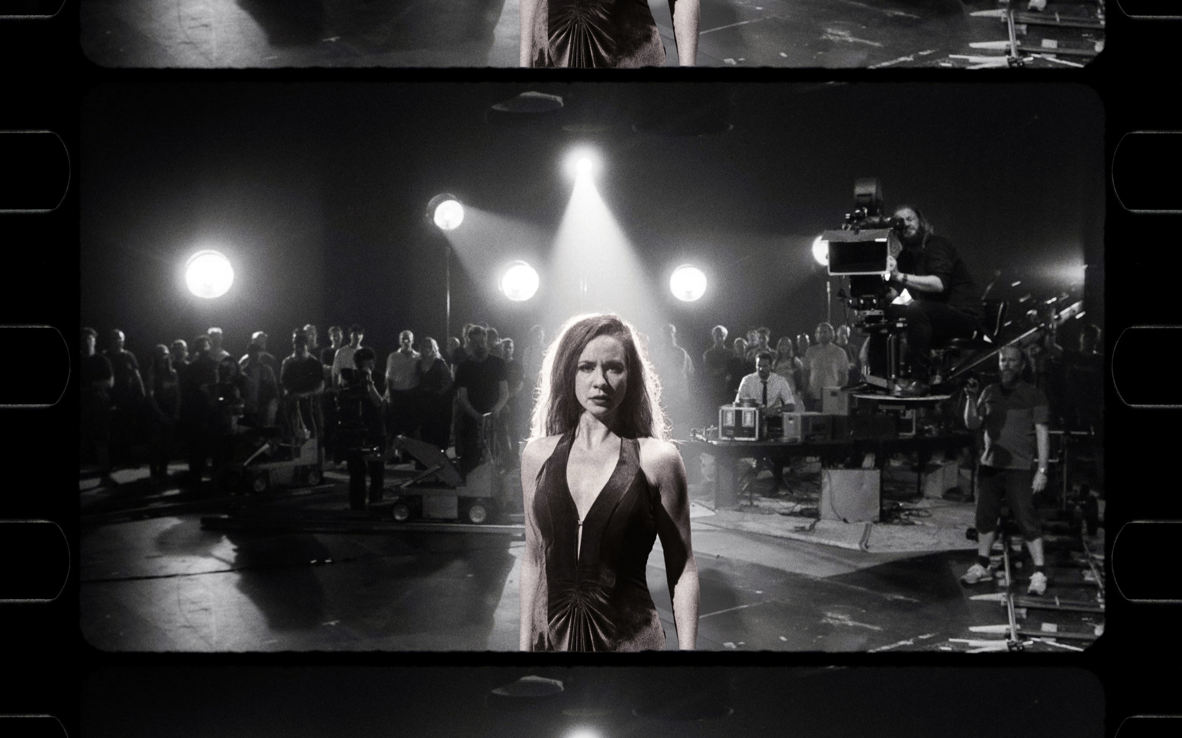 Selene Muñoz and the full film studio seen through a black-and-white film strip from CUT